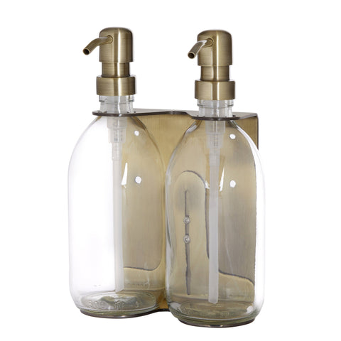 gold double wall mounted holder with clear bottle and gold pumps