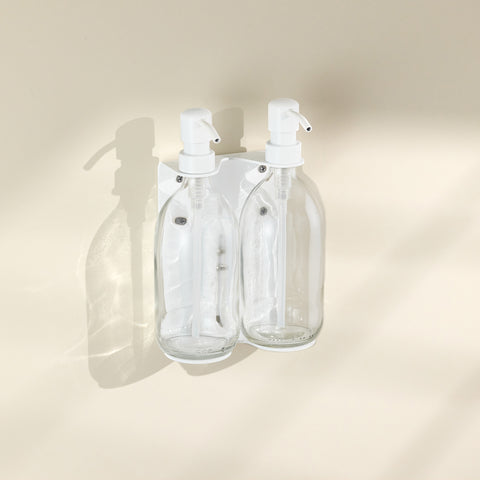 White wall mounted soap dispenser