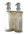 Gold double wall mounted dispenser with clear bottles and silver  pump