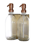 Gold double wall mounted dispenser with clear bottles and copper pump