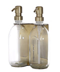 gold double wall mounted holder with clear bottle and gold pumps