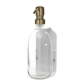 White wall mounted soap dispenser clear bottle and gold pump