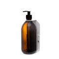White wall mounted soap dispenser amber bottle and plastic pump