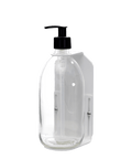 White wall mounted soap dispenser clear bottle and plastic pump