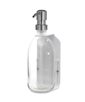 White wall mounted soap dispenser clear bottle and silver pump