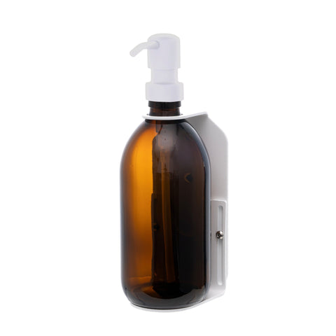 White wall mounted soap bottle